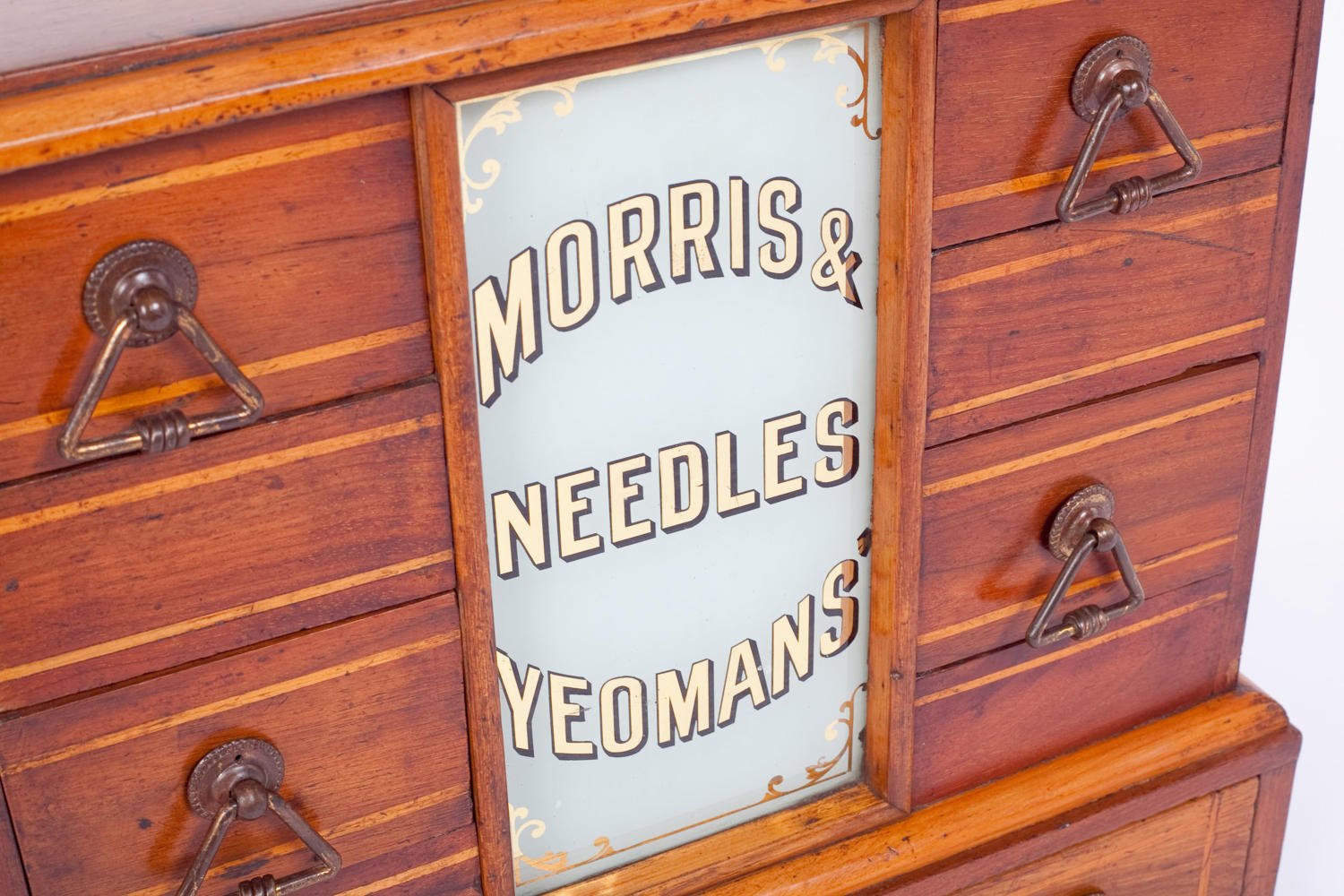 Shop counter display cabinet for Morris & Yeomans' Needles.